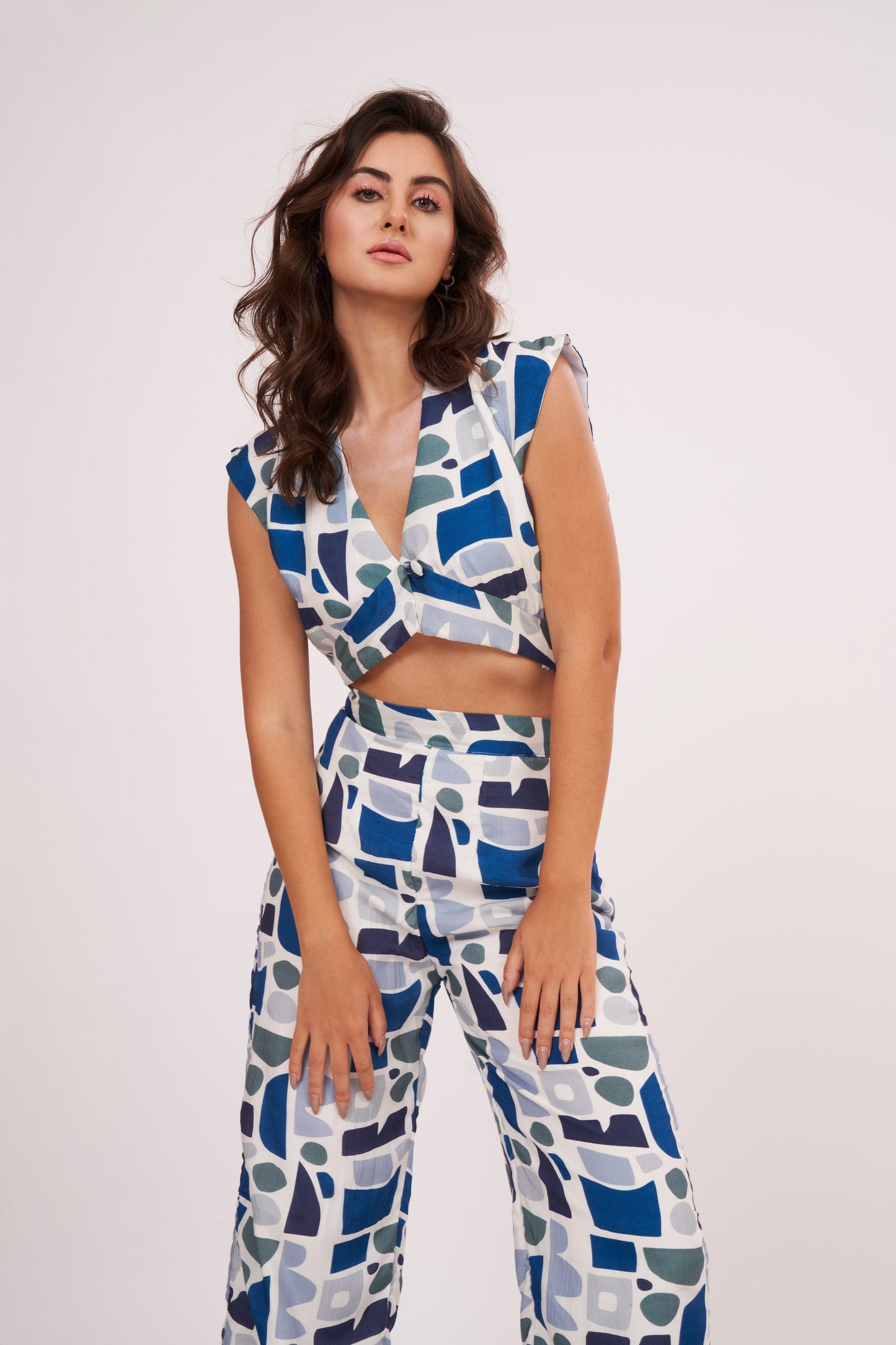 Image of a printed crop top from Designer Co Ord Set made from premium muslin fabric. Trendy v-neck and bold geometric design in vibrant colors.