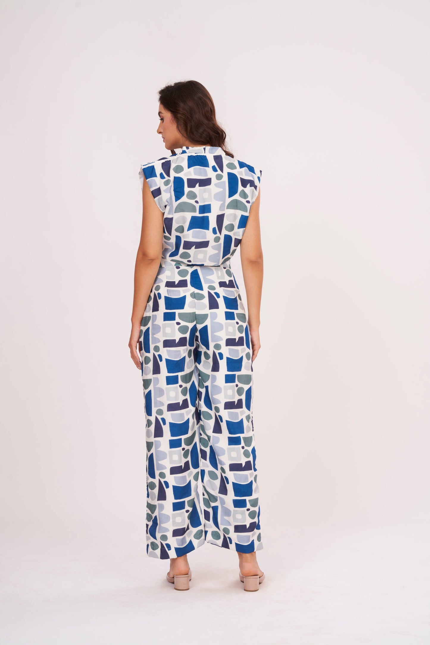 Image of a printed crop top from Designer Co Ord Set made from premium muslin fabric. Trendy v-neck and bold geometric design in vibrant colors.