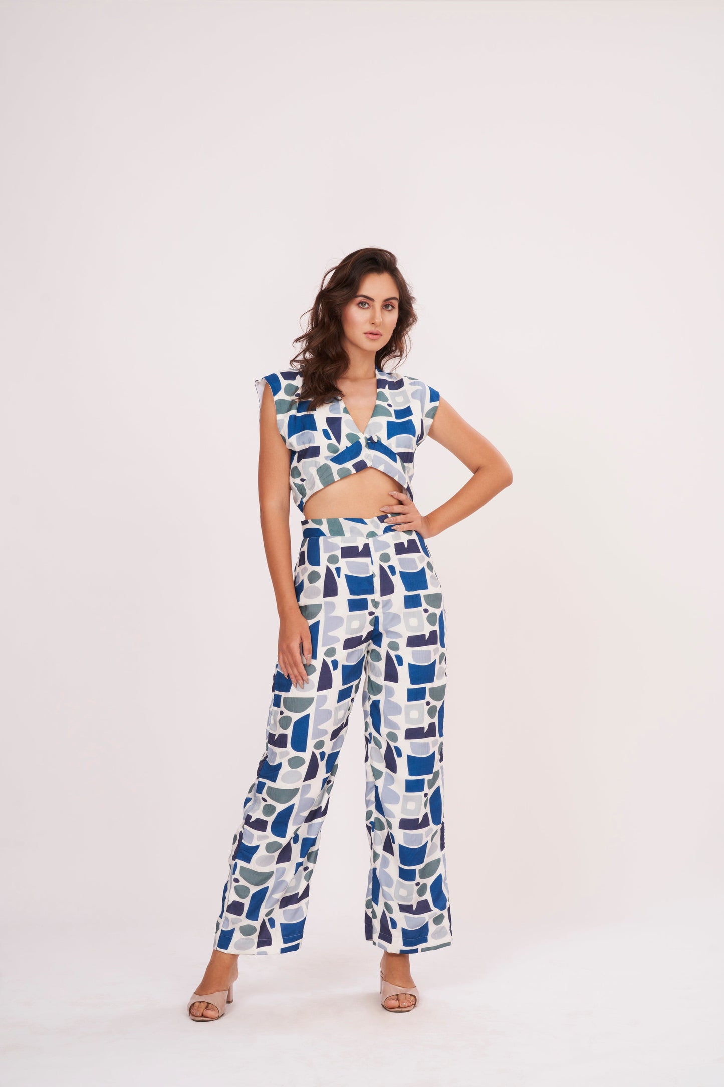 Image of a printed crop top from Designer Co Ord Set made from premium muslin fabric. Trendy v-neck and bold geometric design in vibrant colors.