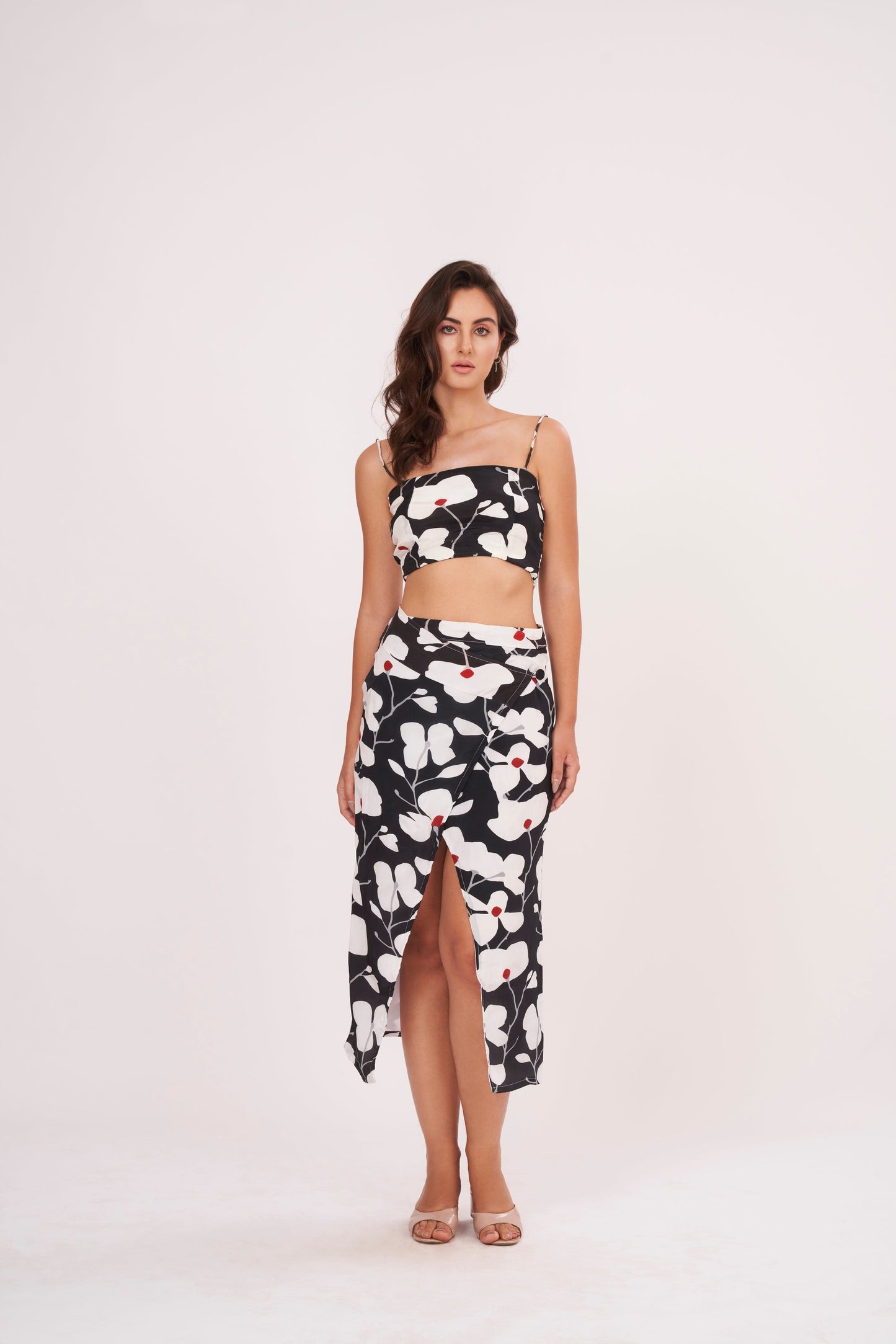 Premium quality crepe spaghetti crop top, hugging curves for an edgy, modern look on a night out or casual date.