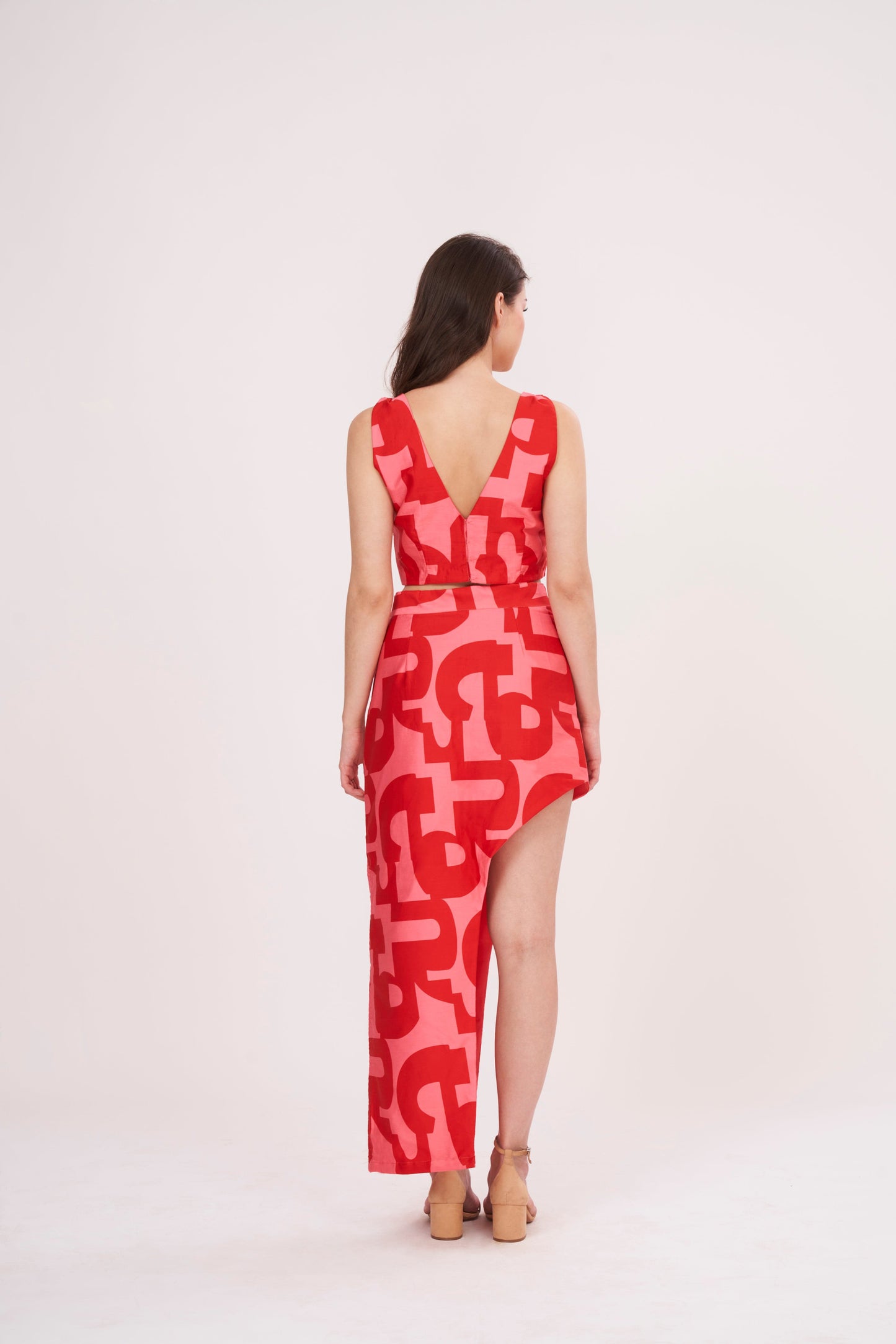 Summer v-neck crop top made from muslin fabric with intricate geometric design.