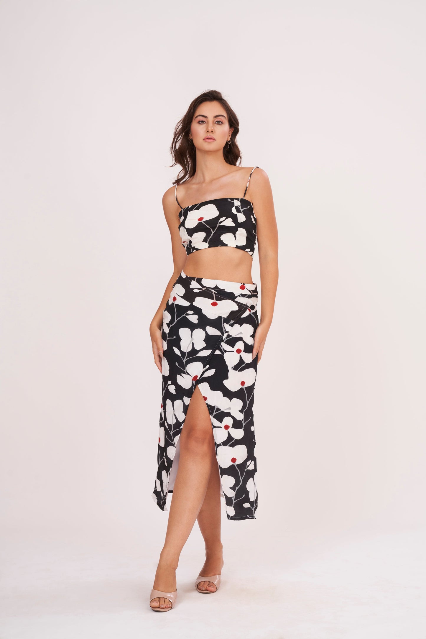Premium quality crepe spaghetti crop top, hugging curves for an edgy, modern look on a night out or casual date.