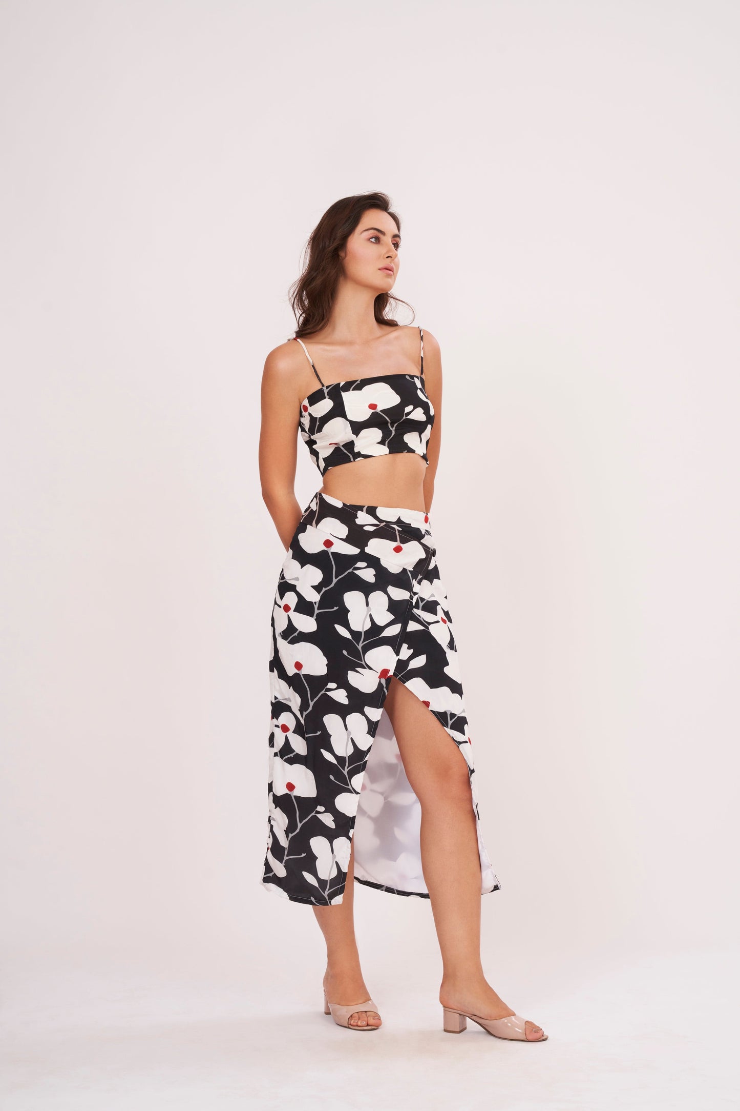 Premium quality crepe spaghetti crop top, hugging curves for an edgy, modern look on a night out or casual date.