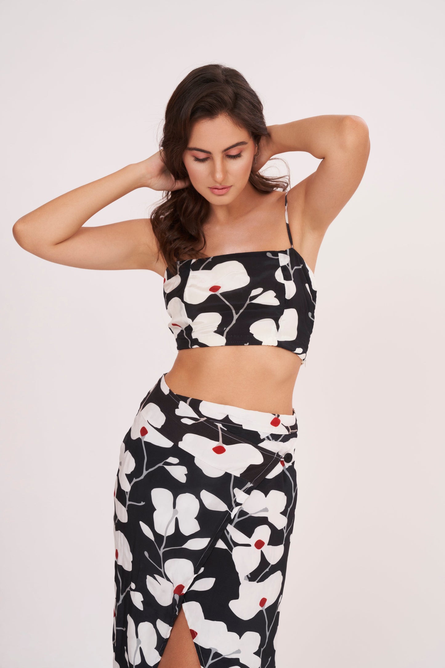 Premium quality crepe spaghetti crop top, hugging curves for an edgy, modern look on a night out or casual date.