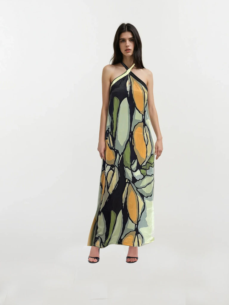 Crepe halter neck maxi dress with crossover neckline and abstract print in olive, mustard, and black