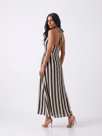 Sophisticated striped maxi dress ideal for cocktail evenings and festive celebrations