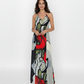 Full-length sleeveless dress featuring a colorful abstract floral pattern, ideal for tropical vacations, garden parties, or elevated resort wear.