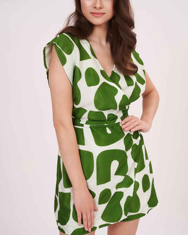 Relaxed fit bodice with extended cap sleeves, highlighting the modern geometric pattern in contrasting shades.