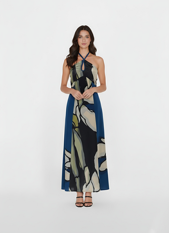Sleeveless ankle-length crepe dress with an abstract floral print in navy, beige, and cream, featuring a flowing hem and elegant movement.
