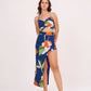 Model in a confident standing pose wearing the blue floral co-ord set with halter neck and asymmetric slit skirt, highlighting the front silhouette.