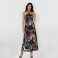 Halter-neck maxi dress with an adjustable tie detail and a flowing silhouette