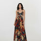 Full-length Bohemian Mosaic Maxi Dress featuring a vibrant, multicolored mosaic-style abstract print and a sophisticated deep V-shape halter neckline.