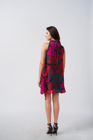 Knee-length chinon dress with a halter tie-back neckline and flowing silhouette