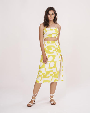 Yellow printed muslin co-ord set with a square-neck top, suitable for summer vacations and daytime outings