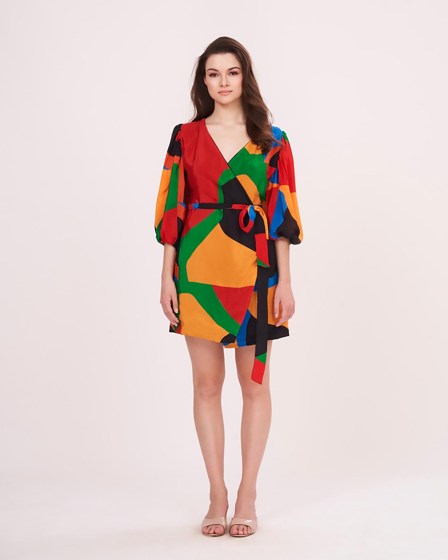 V-neck design crafted from smooth, lightweight fabric, perfect for casual outings and summer day events.