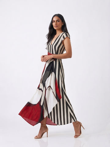 Crimson Élan maxi dress featuring bold black and ivory vertical stripes with a crimson abstract colour-blocked panel.