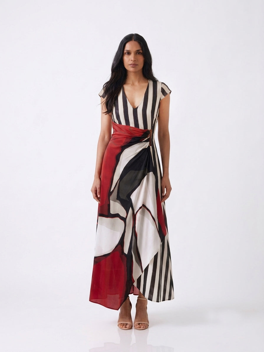 Fluid crepe maxi dress with a defined waist and elegant A-line silhouette.