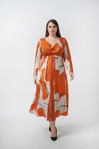 Curve fit cotton satin dress with a twisted neckline and full sleeves, designed to flatter the upper body and add balance