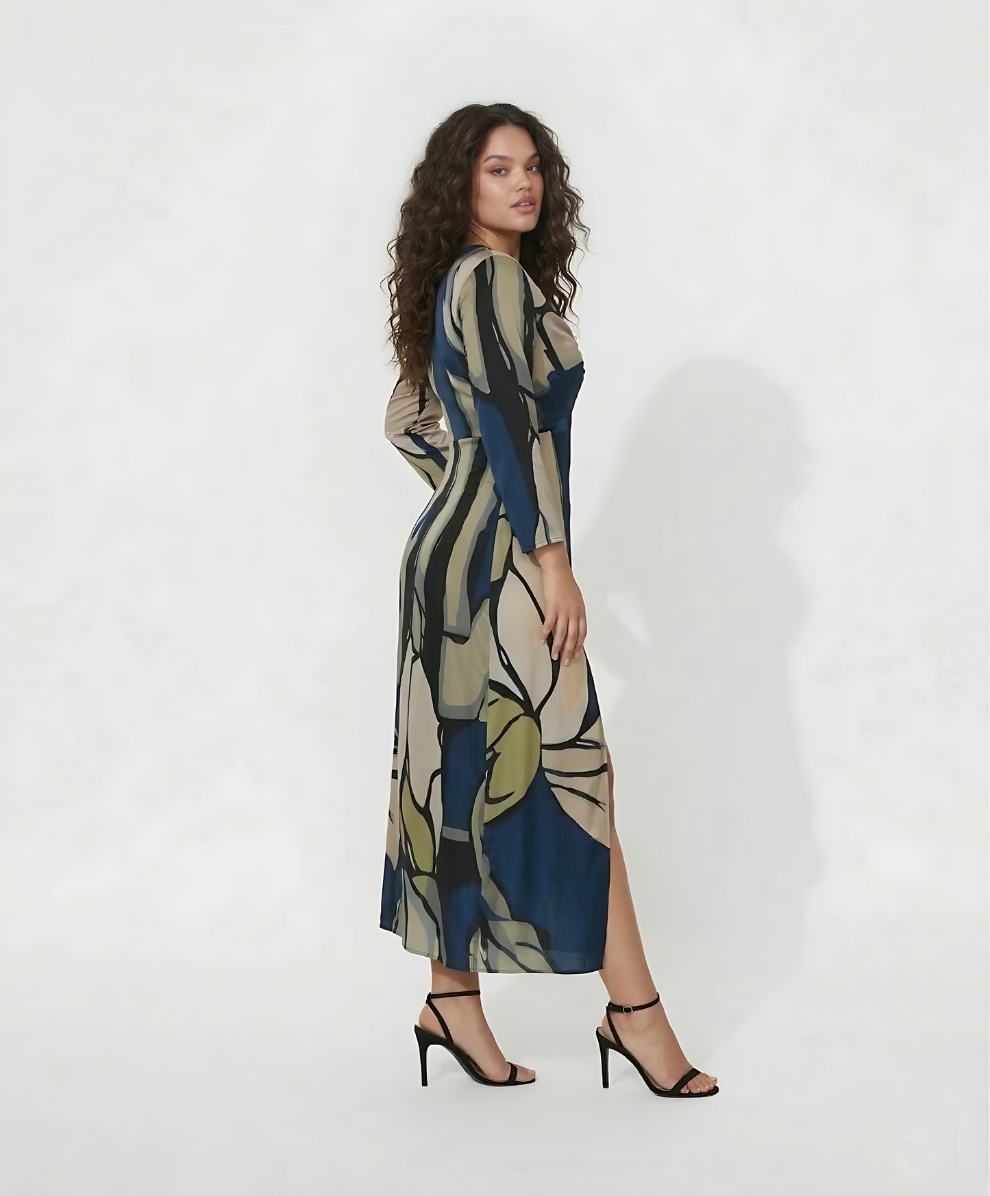 Curve fit crepe dress with a V-neck and twist-front detail, designed to define the waist and flatter the silhouette