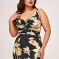 Curve fit floral satin dress with a twisted neckline, designed to frame the upper body beautifully