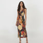 Sleeveless deep V-neck Chinon maxi dress with an abstract mosaic-inspired print, ideal for resort escapes, artful events, or relaxed evening occasions.