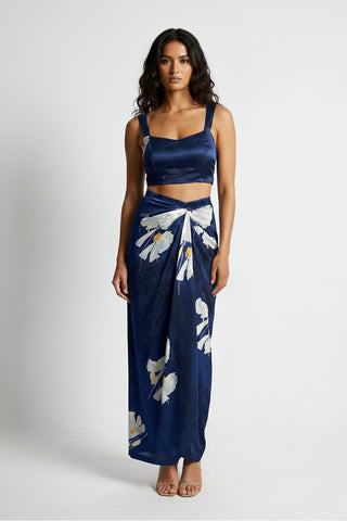 Elegant floral co-ord set featuring structured crop top and draped wrap skirt