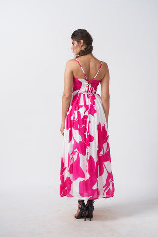 Back view of an ankle-length crepe dress with spaghetti straps and a flowing gathered silhouette