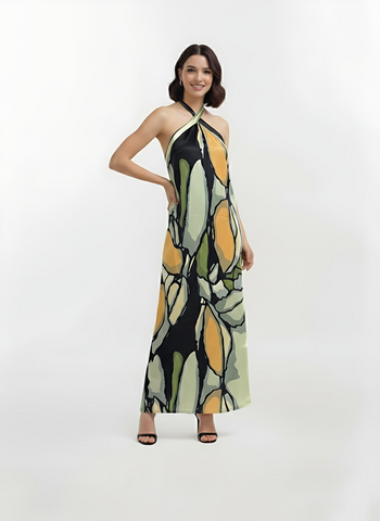 Olive Dawn Maxi Dress made from a lightweight, flowy crepe fabric with a vibrant artistic pattern, ideal for tropical vacations, summer resort wear, or outdoor garden parties.