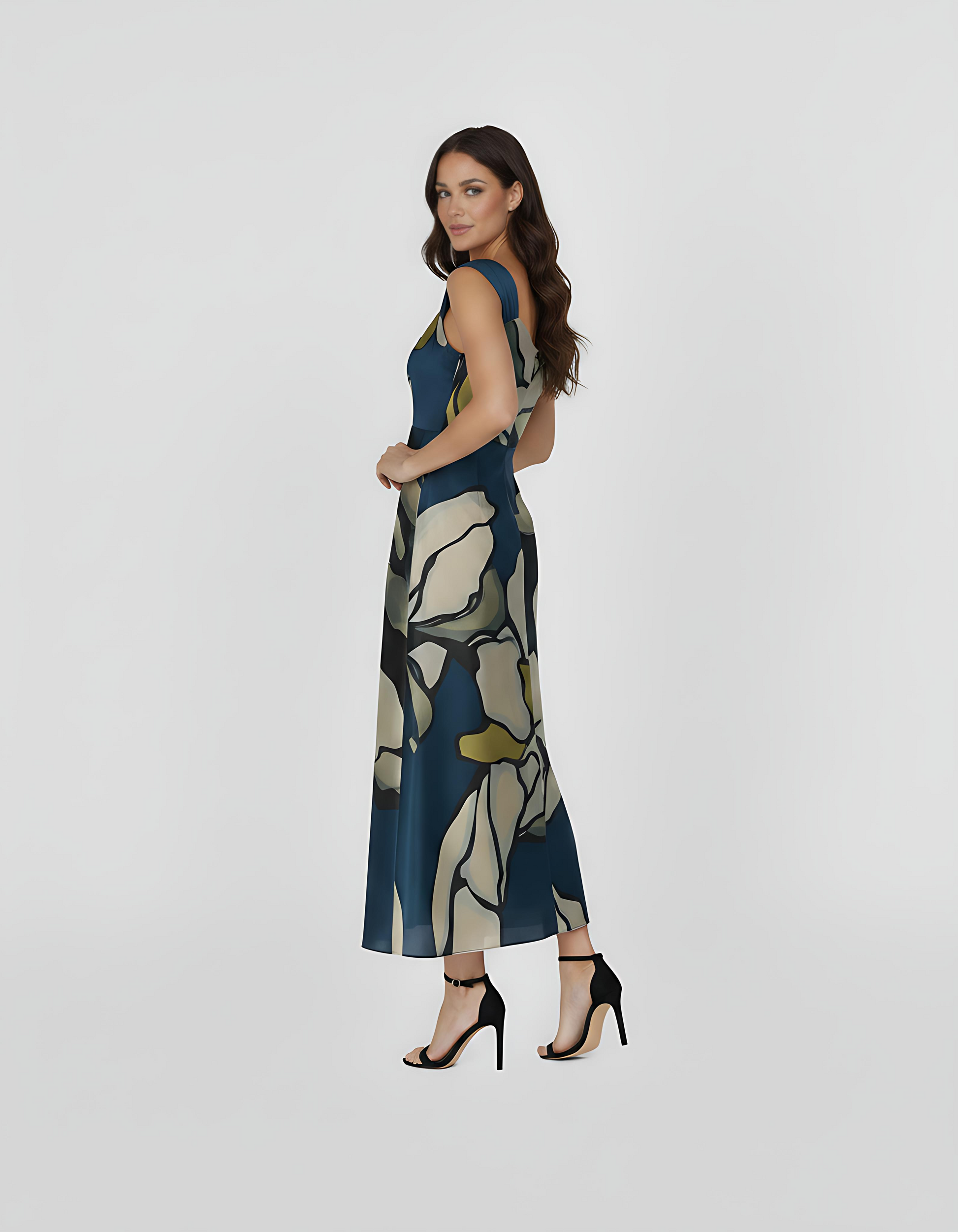One-shoulder evening dress with a deep midnight blue base and contrasting neutral-toned floral accents. The back design features a clean, high-cut finish on one side, showcasing the sophisticated drape of the fabric for special occasions.