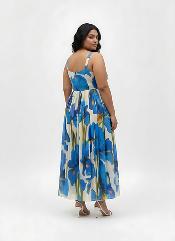 Extended size floral maxi dress with a flowing pleated skirt, perfect for parties, celebrations, and evening occasions