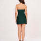 Strapless back design featuring a concealed central zipper closure and a clean, tailored fit.
