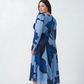 Floral crepe ankle-length dress with long sleeves and a side slit, offering breathable movement and a polished look