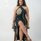 Floral crepe wrap dress with an asymmetric hemline and halter neckline, offering ease of movement and a balanced silhouette