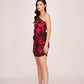 Right side profile of model in black floral printed dress with ruched waist and one-shoulder silhouette.