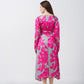 Back view of a pink and grey floral satin midi dress with full-length sleeves and a smooth silhouette