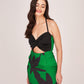 Sweetheart bodice featuring a central twisted knot detail and a stylish midriff cutout. The solid black top contrasts sharply with the vibrant skirt.