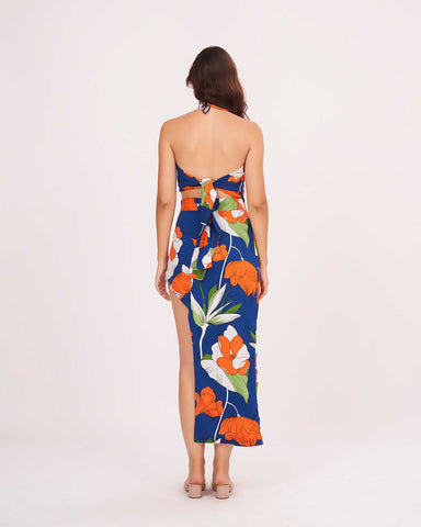 Backless silhouette with adjustable self-tie straps at the neck and reverse for a customized fit.