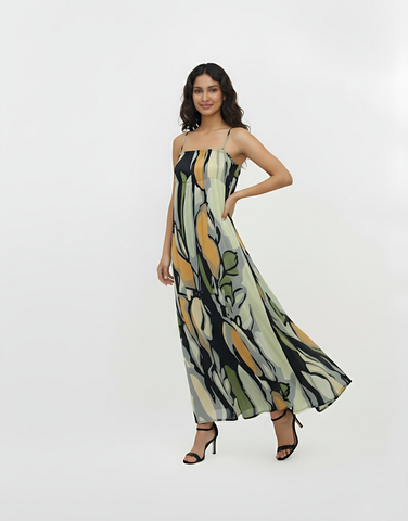 Maxi dress with a flowy hem, designed for effortless movement and ideal for summer resort wear or casual evening events.