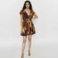 Short V-neck fit-and-flare dress with a contrasting striped waistband and multicolored abstract mosaic print