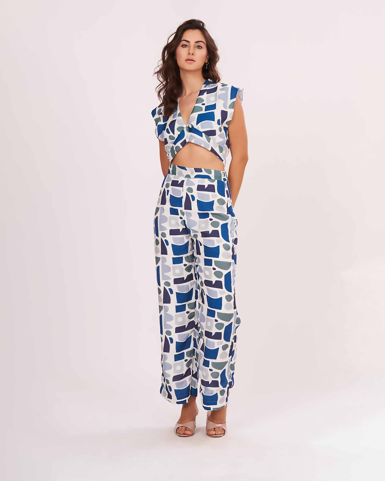 Model standing in the printed muslin co-ord set, showing the relaxed fit and contemporary summer look.