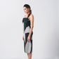 Model walking in green and grey abstract midi dress, showing the smooth drape and confident styling.