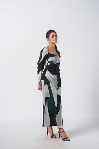 Long-sleeve abstract print ankle-length dress in green and black tones, ideal for evening occasions and standout appearances