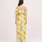 Rear view of the outfit, showing the back fit of the off-shoulder crop top and the comfortable flow of the wide-leg printed pants.