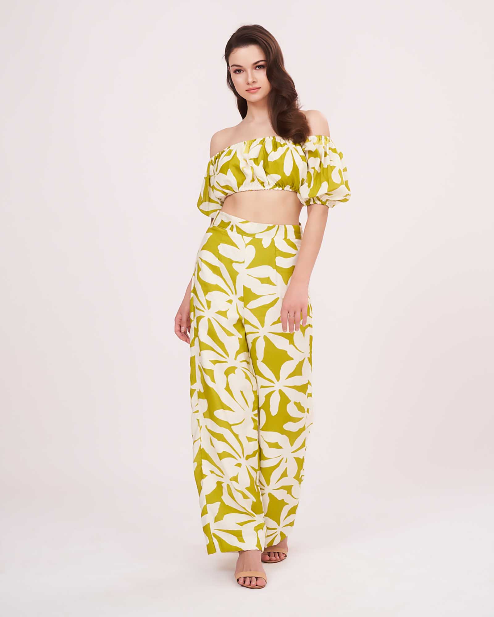 Model posing with one hand on in front, showcasing the flattering elasticated fit and breezy silhouette of the summer co-ord set.