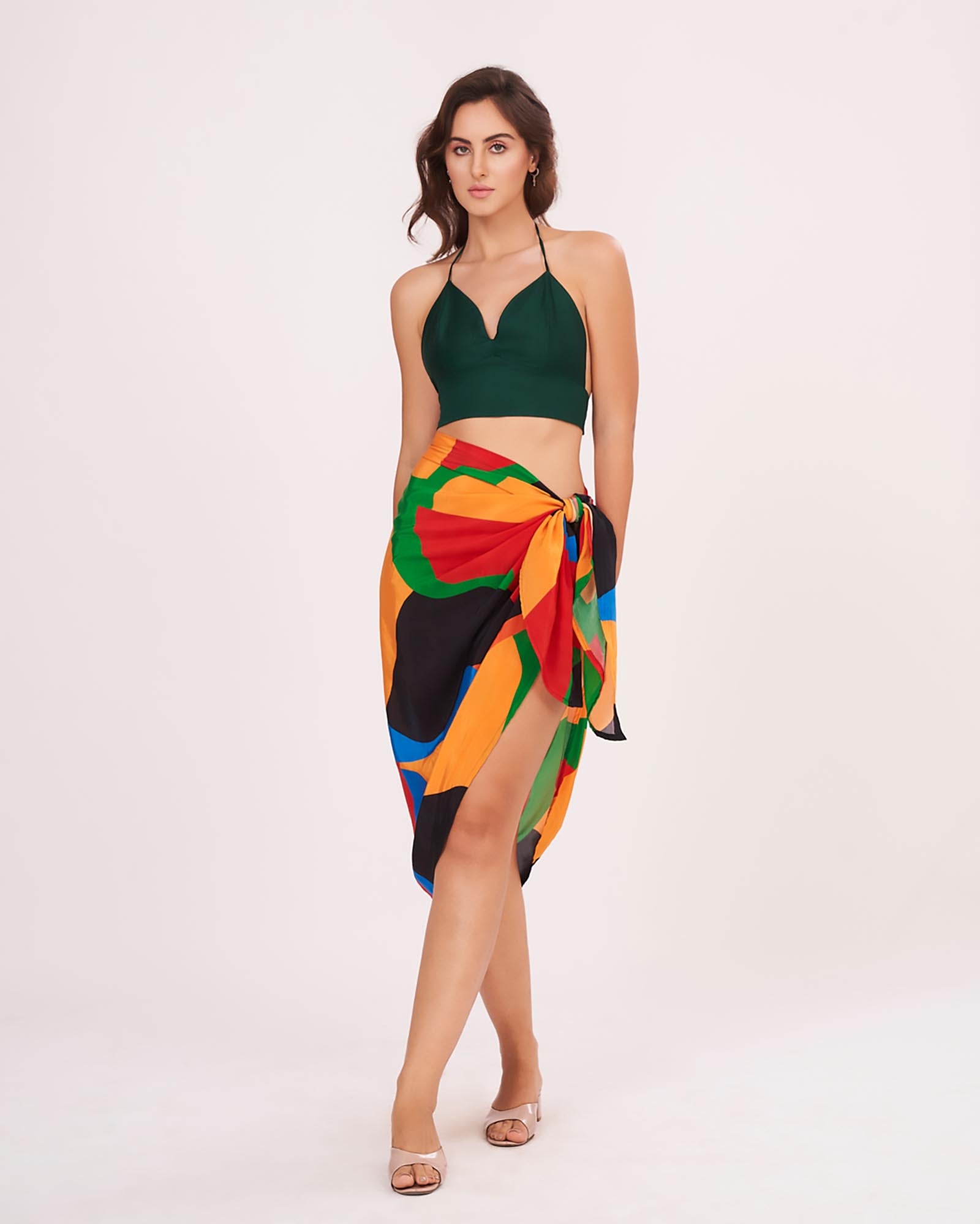 Lightweight two-piece beach set with a breezy silhouette and waist knot detail, ideal for tropical vacations and resort wear.