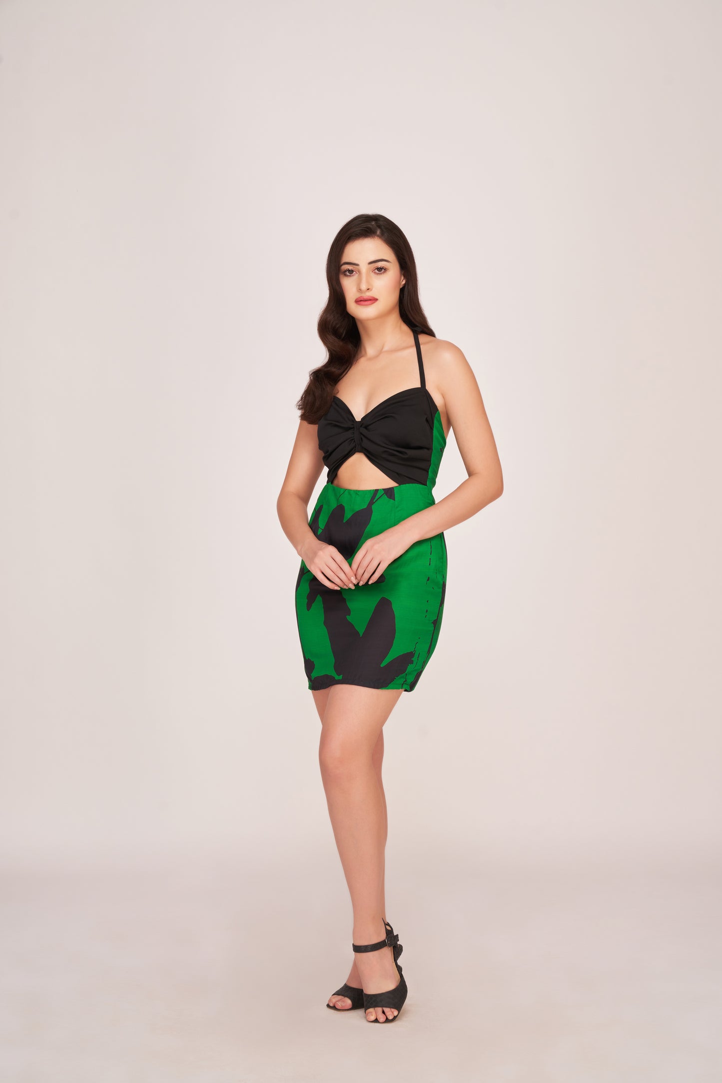 Sleeveless mini silhouette with a playful above-the-knee hemline. The Floral Fusion Elegance is an ideal choice for summer parties, cocktail hours, or date nights.