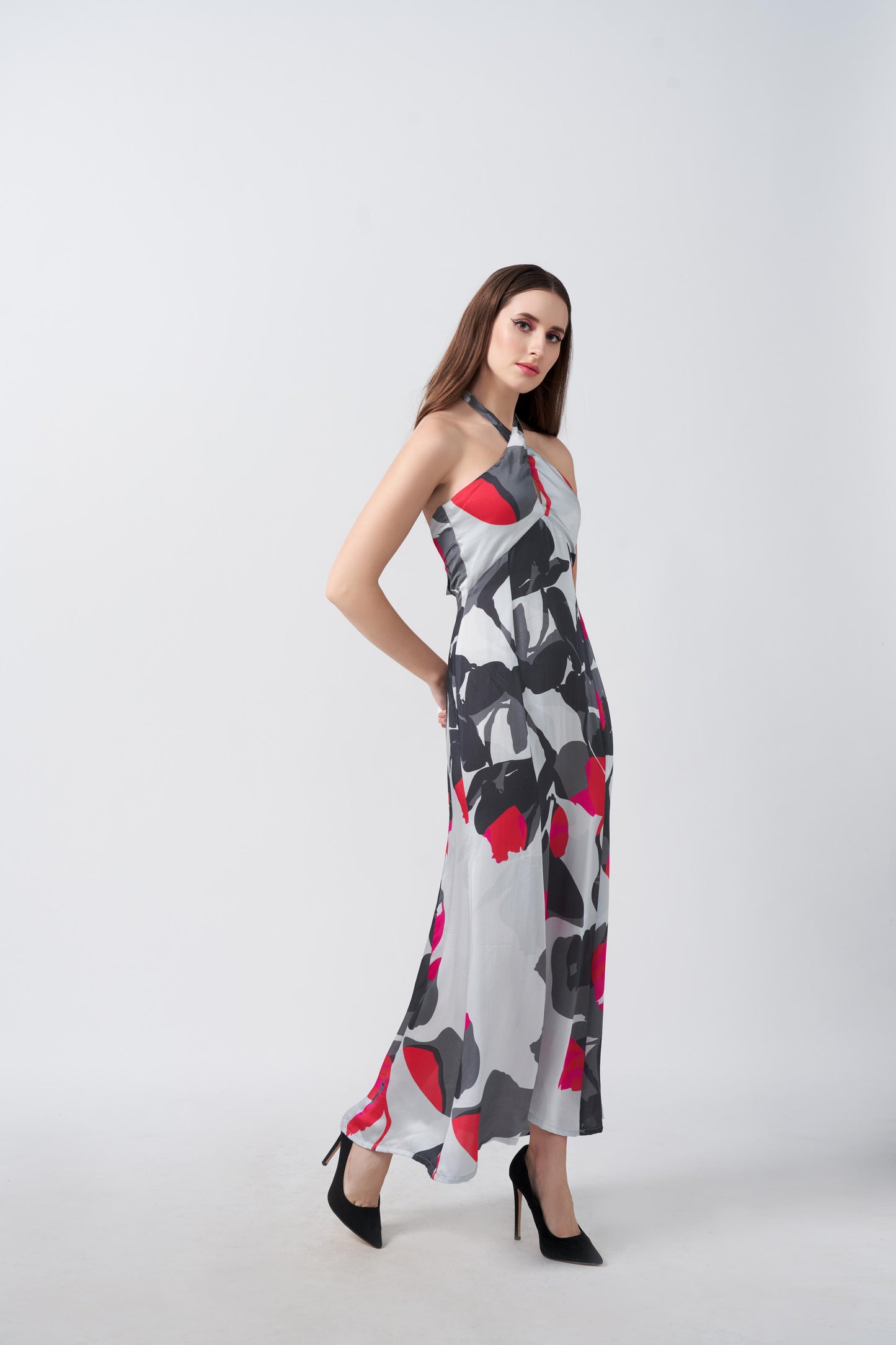Satin ankle-length dress featuring a halter neckline and a fluid, refined silhouette