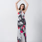 Halter-neck ankle-length satin dress with a tie-back detail and elegant drape