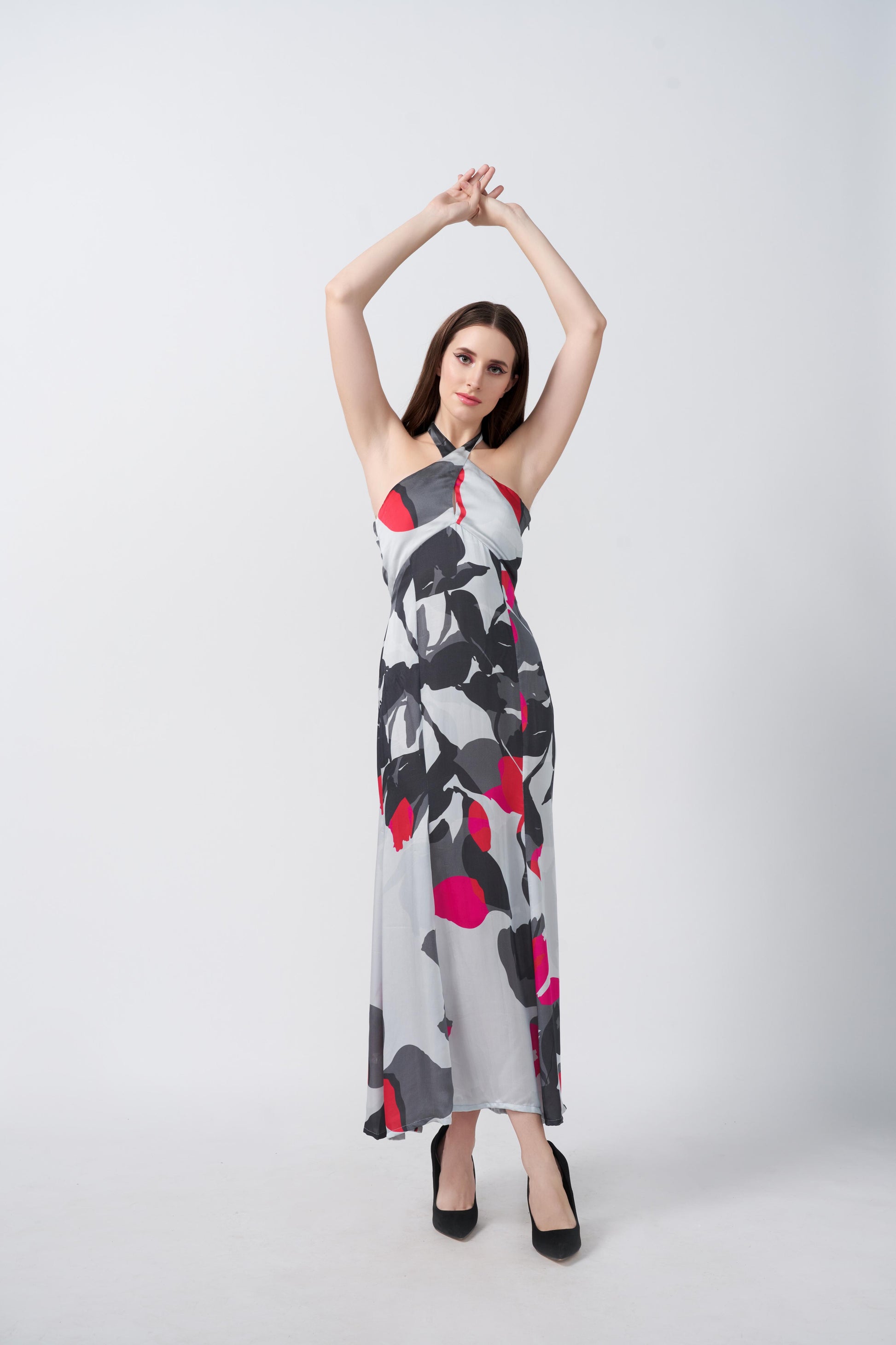 Halter-neck ankle-length satin dress with a tie-back detail and elegant drape