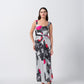 Front-facing view of model in grey and white abstract satin dress with pink-accented front knot.